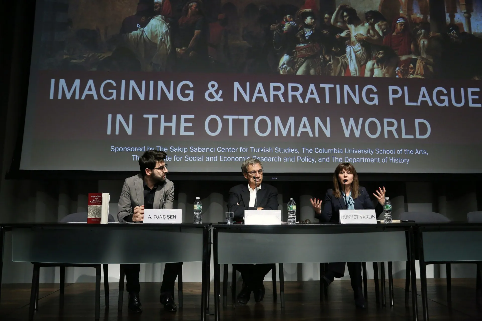 A. Tunç Şen, Orhan Pamuk, and Nükhet Varlık speak on stage for event "Imagining and Narrating Plague in the Ottoman World"